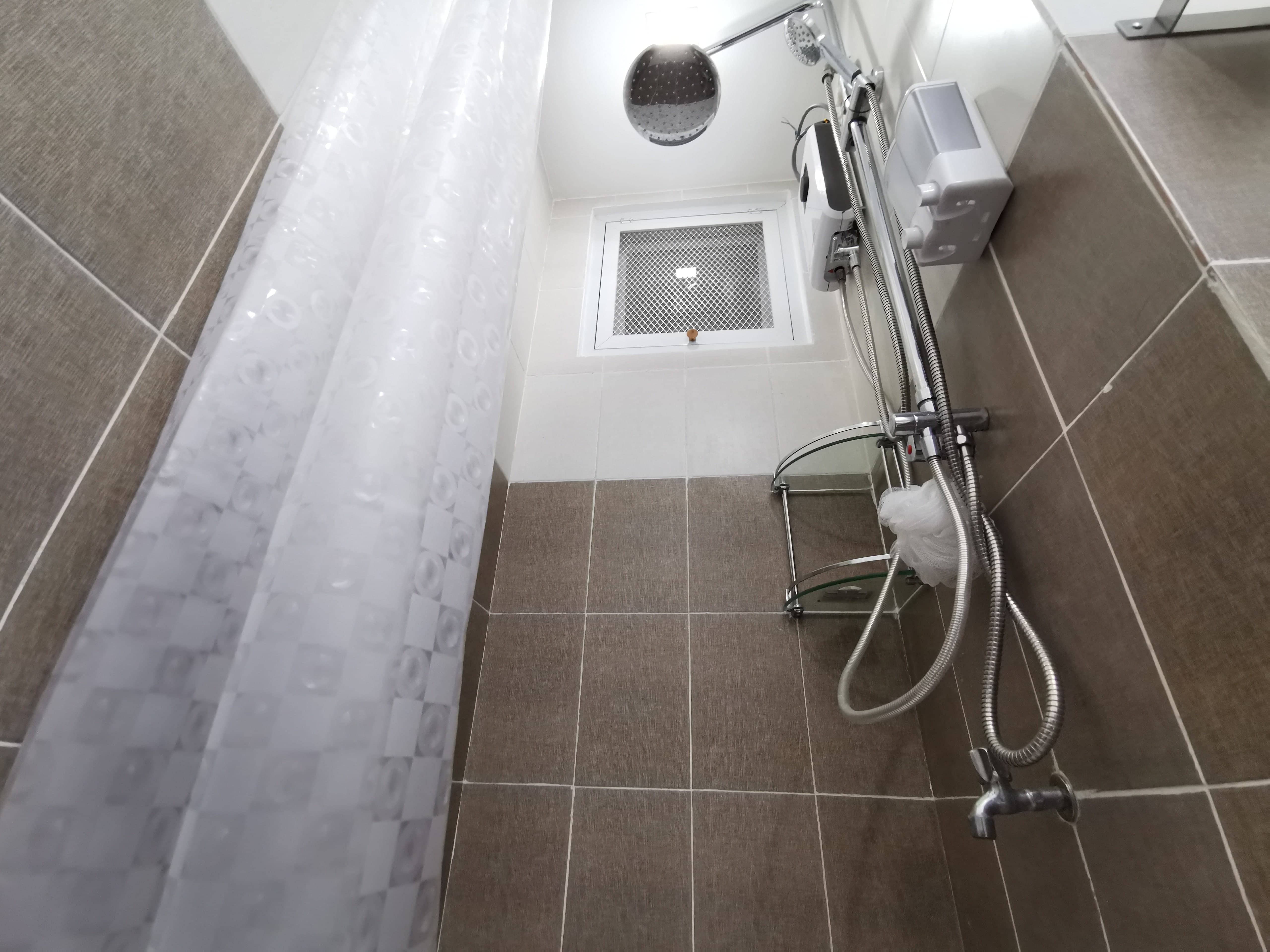 Bathroom with water heater in Baguio real estate property