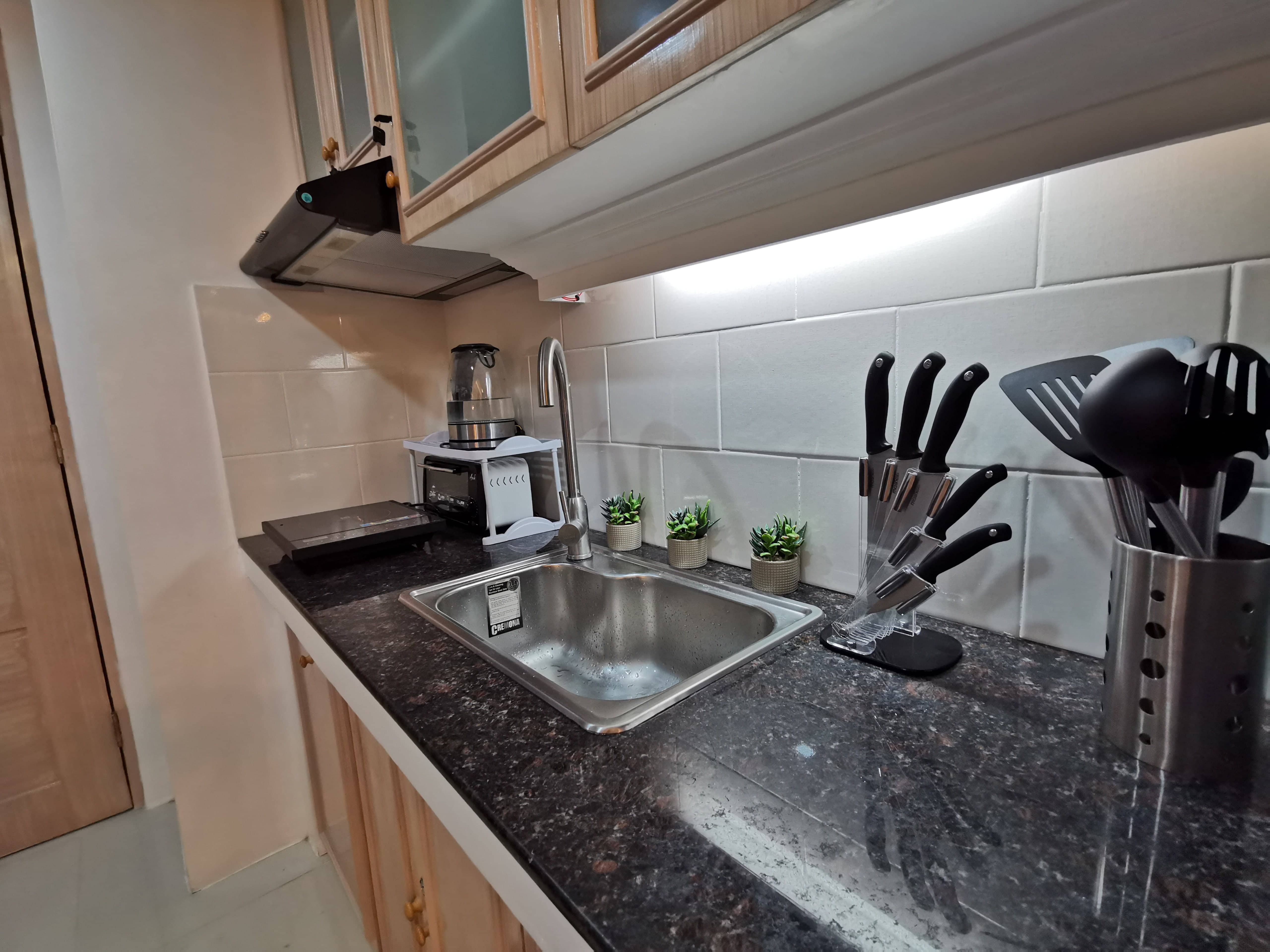 Modern kitchen with appliances in Baguio investment property